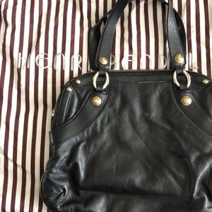 Henri Bendel purse. Own a piece of history with this decadent leather bag.